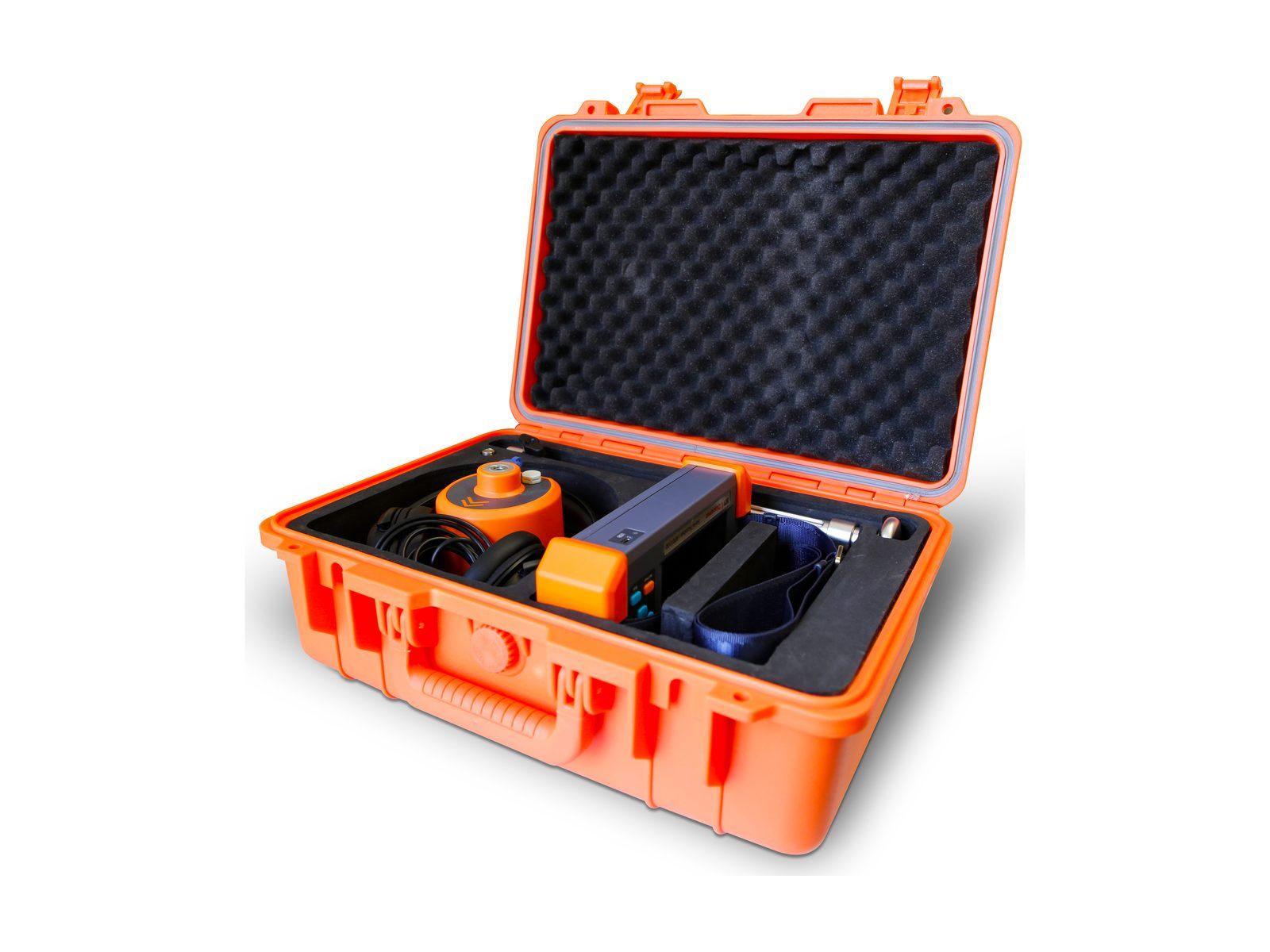 The AP-01 packed in its orange hard case: the orange ground sensor, the receiver, coiled cables, headphones and the neck strap in cut foam.